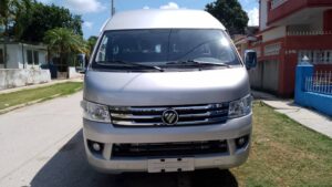 Front view of the new, silver 15-passenger van for the Cathedral in Havana, Cuba