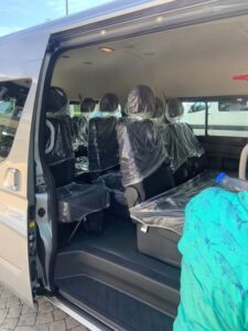 Dark grey interior (with plastic still covering the brand new seats) of the new, silver van for the Cathedral in Havana, Cuba